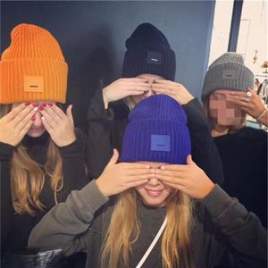 Tasarımcı Beanie AC Gülümseme Yüz Şapkası Erkek Kadın Bonnet Sonbahar Kış Sıcak Erkekler Kadın Kafatası Örme Yün Kapağı Gülümseyen Beanie Tide Street Hip-Hop Şapkalar Moda