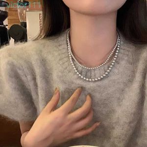 2024 Designers Shi Family French Silver Grey Pearl Necklace For Women's Folding Wing Cold Wind Neckchain Light Luxury High Grund Collar Chain Accessories