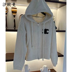 Kvinnors tröjor Autumn Winter Triumphal Arch Hook Flower Hooded Knit Sweater Design Gentle Lazy Style Fried Dough Twits Braid Cardigan Coat