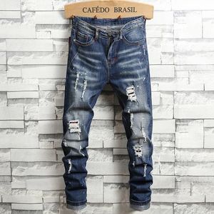 Spring retro jeans maschile elastico slim mezzini di alto livello hiphop mandato di cavo strappato maschio 231227