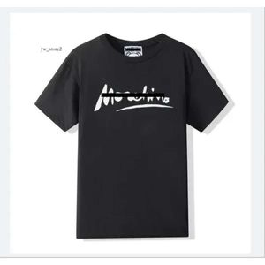 Designer moschino de luxo camiseta marca t camisa roupas spray carta manga curta primavera verão maré homens e mulheres tee moschino 7047