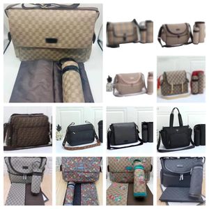 Väskor barn blöja väskor baby designer mens dragkedja ryggsäck mamma multifunktion messenger blöjor väska 3 st.