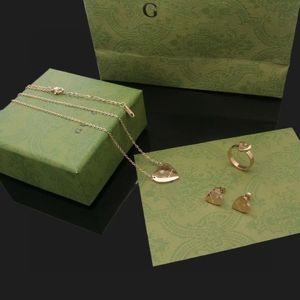 Hoch polierte Hochzeit Schmuckset Einfache Herz Liebe Ringe Halskette Ohrringe Gold plattiert Edelstahl Paar Ringe Mode Frauen Luxus -Sets ohne Kiste