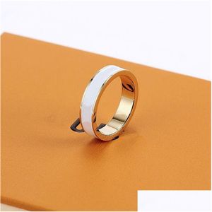 Designer Rings Simple Fashion Letters Men And Women Couple Titanium Steel 18K Gold Plated Ring Non-Fading Anti-Allergy Holiday Gift Dhf4I