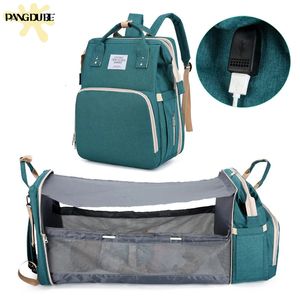 Mommy Bag Portable Baby Crib USB Laddar resväska Baby Diaper Väska för barnvagnens moderskapsväska ryggsäck för mamma baby byte av väska 231227