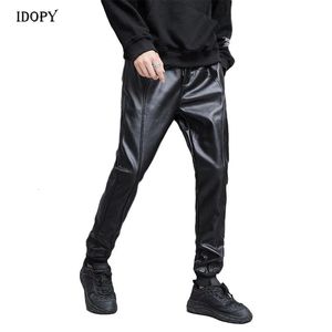 Idopy Herren Herbst Kunstleder Jogger Haremshose Hip Hop Knöchelmanschette Elastische Taille Kordelzug PU Dehnbare Hose für Männer 231228