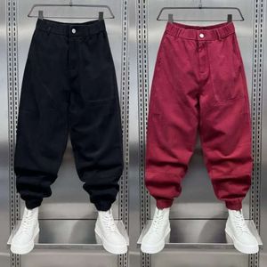 Pantaloni cargo con tasche moltiplicate in cotone Moda pantaloni larghi Harem larghi hip-hop Nuovi pantaloni rossi autunnali Abbigliamento da uomo di marca di marca
