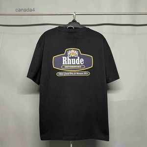 Rhude Shirt Mens Designer Classic F1 TグラフィックティーTシャツ機能は、スクリプトの具体化されたカスタムフィットビンテージコットンショートスリーブティーシャツLPM U3AD