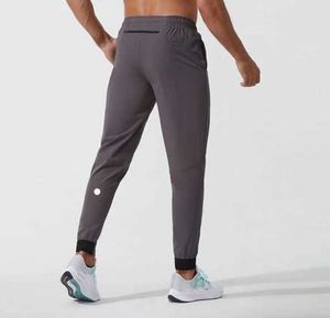 Lululemen calças curtas yoga outfit jogger esporte secagem rápida cordão ginásio bolsos moletom calças dos homens casual cintura elástica fitness homem 31