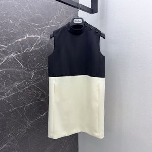 Womens klänning Europeiska modemärke minimalistiska svartvitt färgblock stående krage ärmlös väst miniklänning