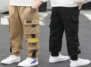 Pantaloni cargo laterali con nastro da ragazzo per bambini Pantaloni larghi stile adolescente Pantaloni cargo neri kaki Pantaloni sportivi classici per bambini per Big Boy 413 anni LJ1004340