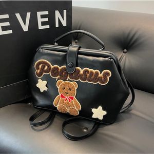 Factory sales womens shoulder bag 2 colors can be thickened leather student backpacks Joker cartoon fashion handbag popular embroidery patch women backpack 6241#