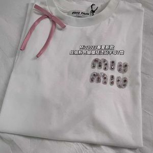 23夏miu *レタースタッズ付きダイヤモンドピンクリボンボウホワイト短袖Tシャツトップ