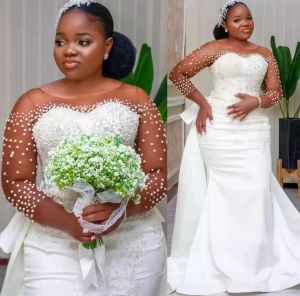 2024 African Sexy Wedding Dresses Bridal Gowns Lace Appliques Crystal Beads Pearls Illusion Mermaid Long Sleeves Custom Plus Size Detachable Train Overskirts