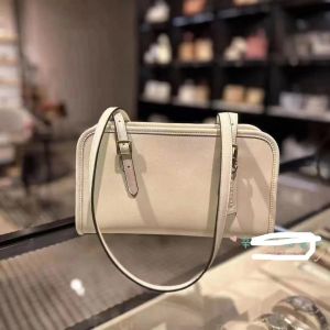 Designer högkvalitativ swing zip lyxdesigner vintage coa ch blommor väskor läder kvinnlig mode trend crossbody axelväska plånbok