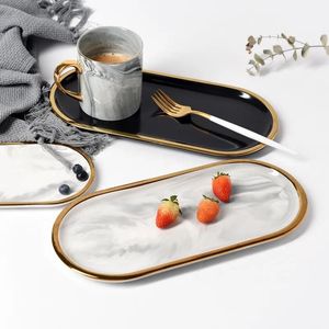 Piatti Placcatura in oro Vassoio portaoggetti in marmo ceramico Nero Bianco Europa Cibo Frutta Colazione Piatto ovale Vassoio per gioielli Decorazione piatto da dessert