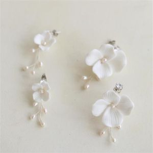 Orecchini a forma di fiore in ceramica bianca Set di gioielli da sposa per matrimonio Perle d'acqua dolce Fiori Orecchini floreali Fascino alla moda che cade lungo Drop302y