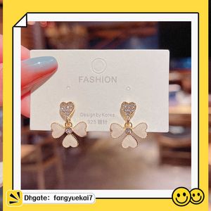 2024 Designer 925 silver needle South Korea's shiny delicate diamond snowflake earrings female fashion exaggerated geometric earrings factory UTRZ