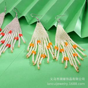 Brincos pendurados franja mão tricô moda frisado flor liga feminina simples bohemia originalidade arroz grânulo