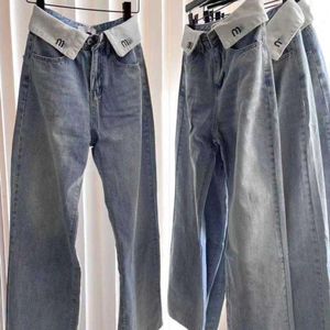 Jeans jeans gamba dritta bassa ascesa pantaloni miu rotolo lettera ricamare designer pantaloni donne sciolte sembrano sottili e coprono i fianchi wzht