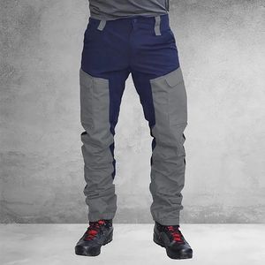 Spodnie Casual Men Mode Mash Color Block Multi Pockets Sporty Długie spodnie ładunkowe Pracuj spodnie dla mężczyzn.