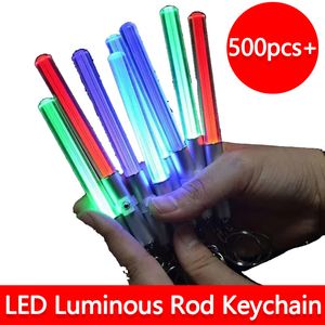 Ny LED -ficklampa Stick Keychain Party Favor Mini Torch Aluminium Keychains Key Ring Durable Glow Pen Magic Wand Stick Lightsaber LED Light Stick