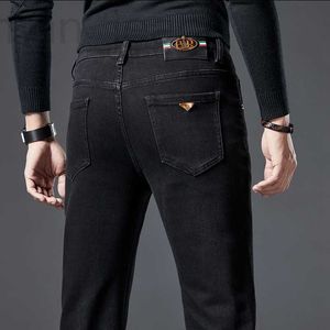 Designer de jeans masculino 2022 outono/inverno edição coreana cintura média e pé pequeno ajuste fino preto algodão elastano calça versátil 9FWU