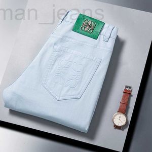 Jeans masculino designer 2023 primavera novo ajuste fino algodão marca coreana jovem calças versáteis para homens 0PEN