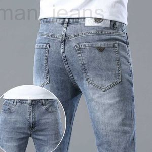 Мужские джинсы дизайнер Весна / Лето Тонкие корейские версии Slim Fit Высококачественные европейские AJ Guangzhou Xintang Denim Pants WG6P
