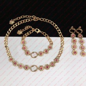 Orecchini girasole in oro, bracciale e collana in ottone. Orecchini firmati da donna. Orecchini regalo da sposa per San Valentino. Gioielli firmati di marca.