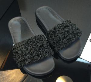 Designer flätade stickade sandaler lyxiga kvinnor glider mulor kedja stickad plattform toffel