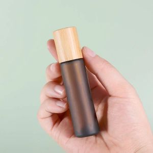 Rolo vazio de 15ml em garrafas de vidro com tampa de bambu bola de rolo de aço âmbar vidro fosco transparente óleo essencial frasco de perfume simples