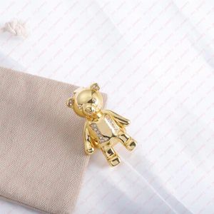 Women's cute bear brooch in brass. Fashion designer brooch. Brand jewelry.