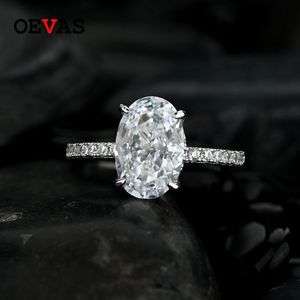 Z kamieniami bocznymi OEVAS 100 925 Sterling Silver 8 12mm owalne musujące diamentowe obrączki o wysokiej zawartości węgla dla kobiet Party Fine Jewelry hurtownie 230704