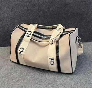 Männer Mode Duffle Tasche Große Kapazität Leinwand Reisetaschen Frauen Gepäck Tote Outdoor Reisen Handtaschen Geldbörse Geschenk AAA