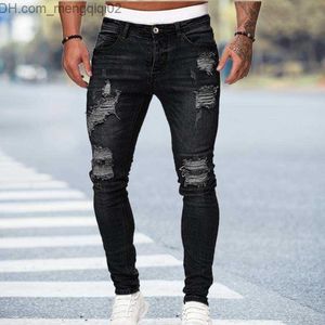 Мужские джинсы Черные джинсы скинни мужчины сорванные джинсы. Мужчина Новая повседневная дыра летняя улица хип -хоп стройные джинсовые брюки мужчина модные брюки бегунов x0621 Z230706