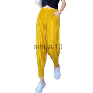 Women's Pants Capris Fashion Miyake Folds Female Pants New Summer Korean Version Leisure Radish Pencil Pants Loose Wild Nine Points Women Harem Pants J230705