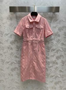 Abito estivo da donna Gonna stampa scozzese da donna Lettera stampata mezzo petto Manica corta Versione a trapezio Gonne Decorazione catena di moda Abbigliamento da donna 55