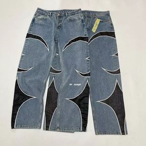 Thug club Jeans lavati per uomo Oversize in pelle Patched Denim Jeans larghi causali Moda Jeans larghi da uomo Hiphop Streetwear Lavato Distressed Jeans micro svasati