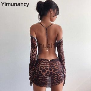 Sıradan elbiseler yimunancy leopar baskı sırtsız elbise kadınlar uzun kollu örgü elbise 2021 bahar yular şeffaf seksi kulüp elbise vestidos j230705