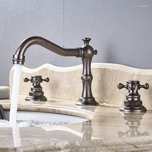 浴室のシンクの蛇口 Vidric アンティーク真鍮デッキマウント洗面台の蛇口普及した洗濯タップデュアルハンドル 3 穴ミキサー