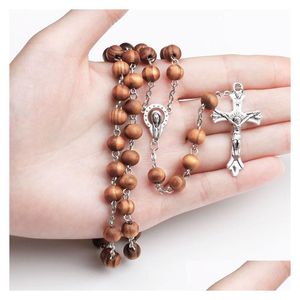 Collane con ciondolo Nuove perle di legno Catene lunghe Collana con rosario cattolico per donne e uomini Christian Gesù Vergine Maria Croce Crocifisso Dhb3M