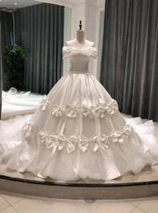 Białe tiulowe satynowe suknie ślubne z odkrytymi ramionami kokardka księżniczki zroszony perły kościół królewska suknia ślubna vestido de noiva