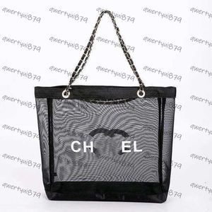 Designer Handbag Single shoulder shopping bag fashion hollowed out transparent Mesh beach bag Ladies large capacity Tote bag Makeup bag designer bag qwertyui879