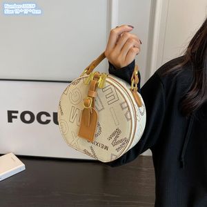 Factory wholesale ladies shoulder bags 3 colors cute round printed handbag styling contrast leather fashion mobile phone coin purse plug-in belt handbags 3057#