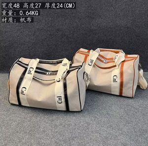 أزياء حقائب السفر عالية الجودة من القماش سعة كبيرة الحمل على أمتعة دوفيل أكياس فاخرة للجنسين حقيبة اليد حقيبة يد