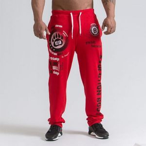 Pantaloni da uomo Sport Allenamento di pallacanestro americano sciolto Autunno e inverno Pantaloni fitness hip-hop stampati di marca alla moda