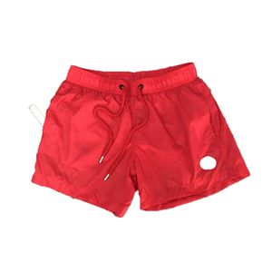 Pantaloncini corti firmati da uomo Microproiettile da spiaggia impermeabile Più colori Moda Coppie Pantaloni da motociclista estivi con pantaloncini serie con coulisse