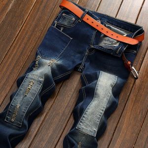 Jeans da uomo Harajuku Moda stile coreano 2023 Ultimo blu con patchwork di fori afflitti hip-hop per uomo Pantaloni vintage casual