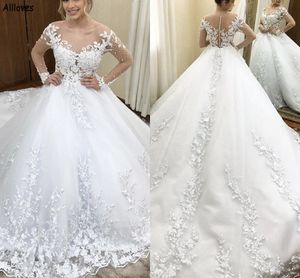 Affascinante abito da sposa in pizzo con applicazioni di abiti da sposa con maniche lunghe con collo trasparente Abiti da sposa vintage Plus Size Sweep Train Buttons Back Dubai Arabo Vestidos CL2569